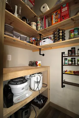 a shelf with books and knick knacks on it