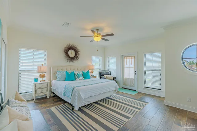 a view of a house with wooden floor and wooden fence