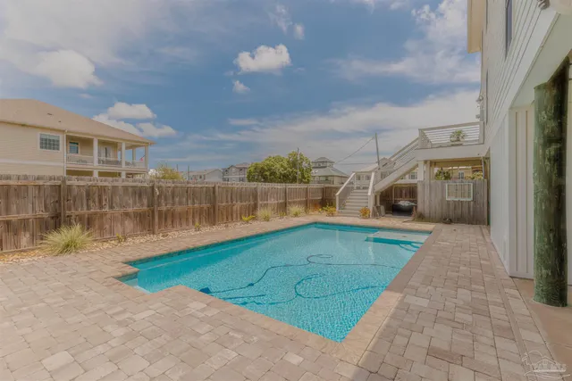 a view of a chairs on the deck
