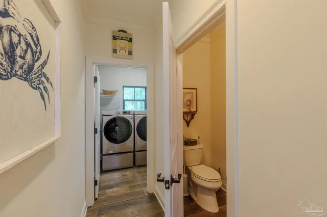 a bathroom with double sink and a mirror