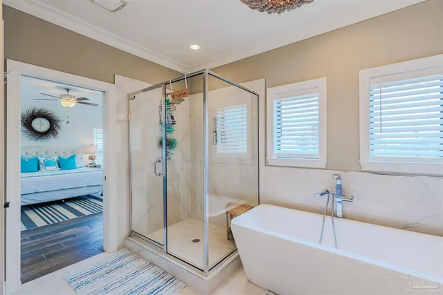 a view of an entryway with wooden floor and windows
