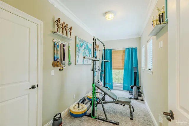 a living room with couch and a table
