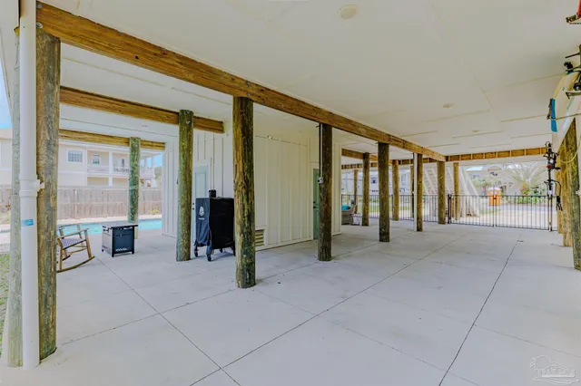 a view of a city with lush green forest