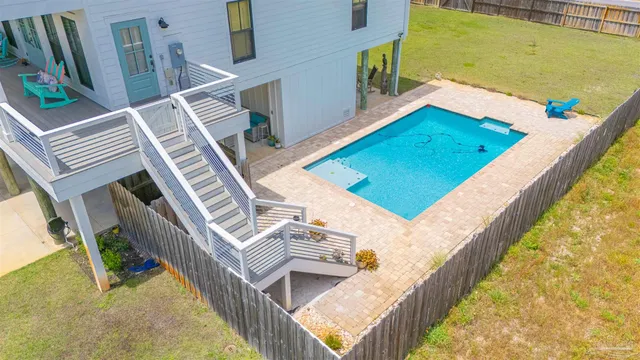 a view of a balcony with chairs