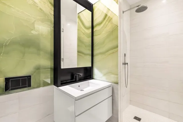 a bathroom with a sink and a mirror