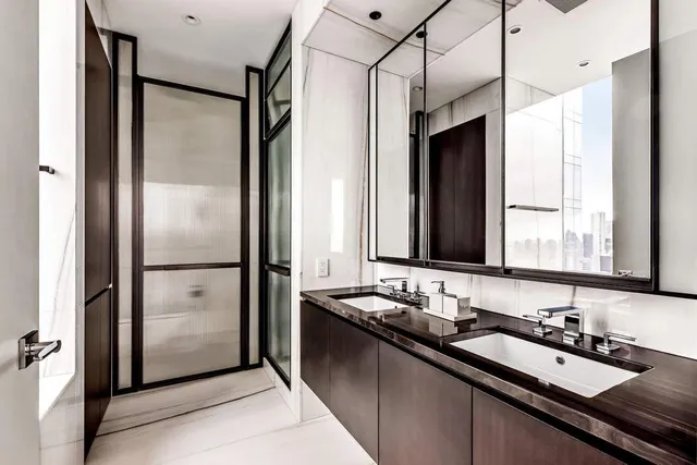 a very nice looking room with a large window and sitting area