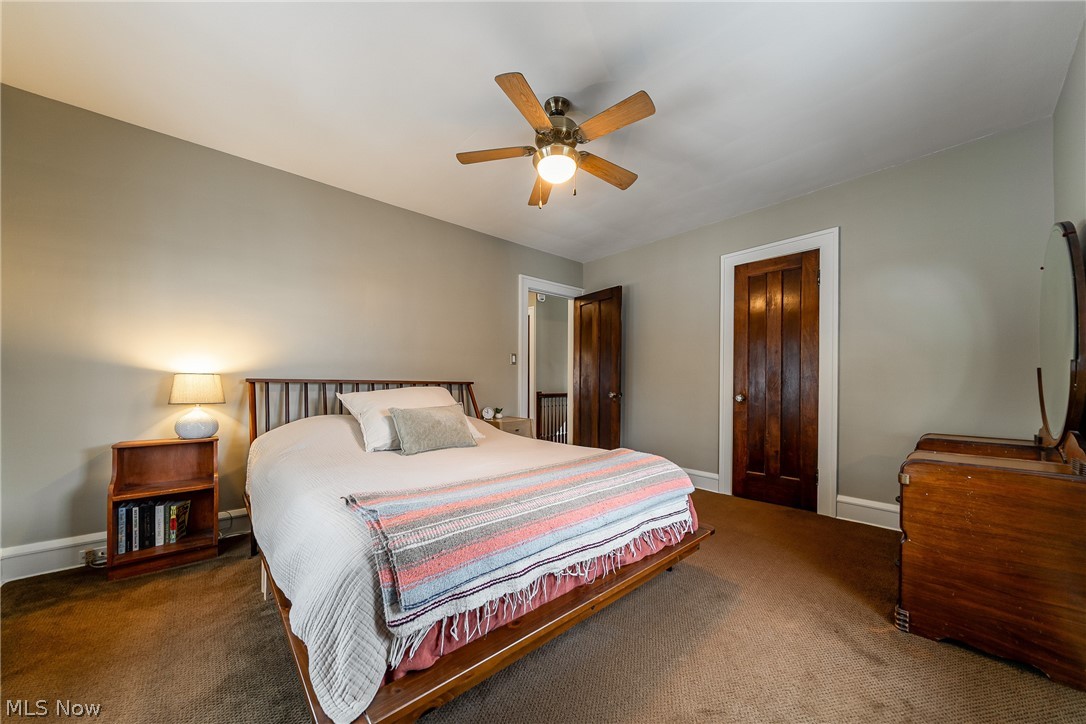 2904 Clarkson Road Cleveland Heights, OH 44118 - Photo 19 of 43 Bedroom featuring dark carpet and a ceiling fan
