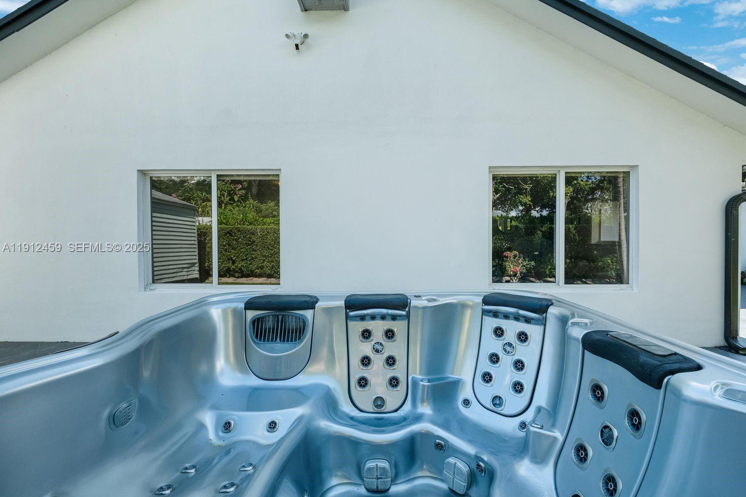 10025 Southwest 83rd Street Miami, FL 33173 - Photo 29 of 37 a front view of a house with window