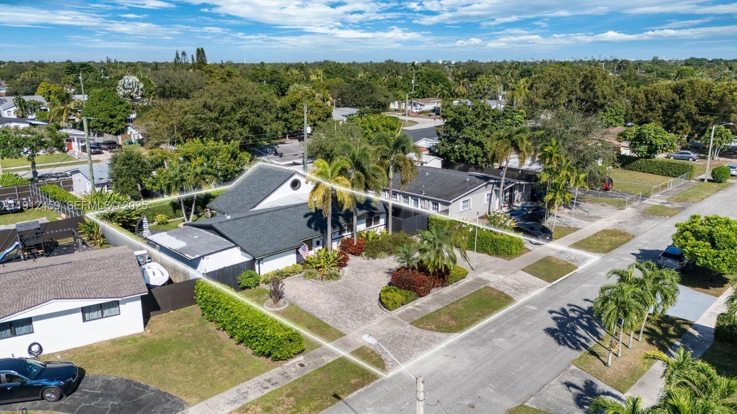 10025 Southwest 83rd Street Miami, FL 33173 - Photo 33 of 37 an aerial view of a house with a yard