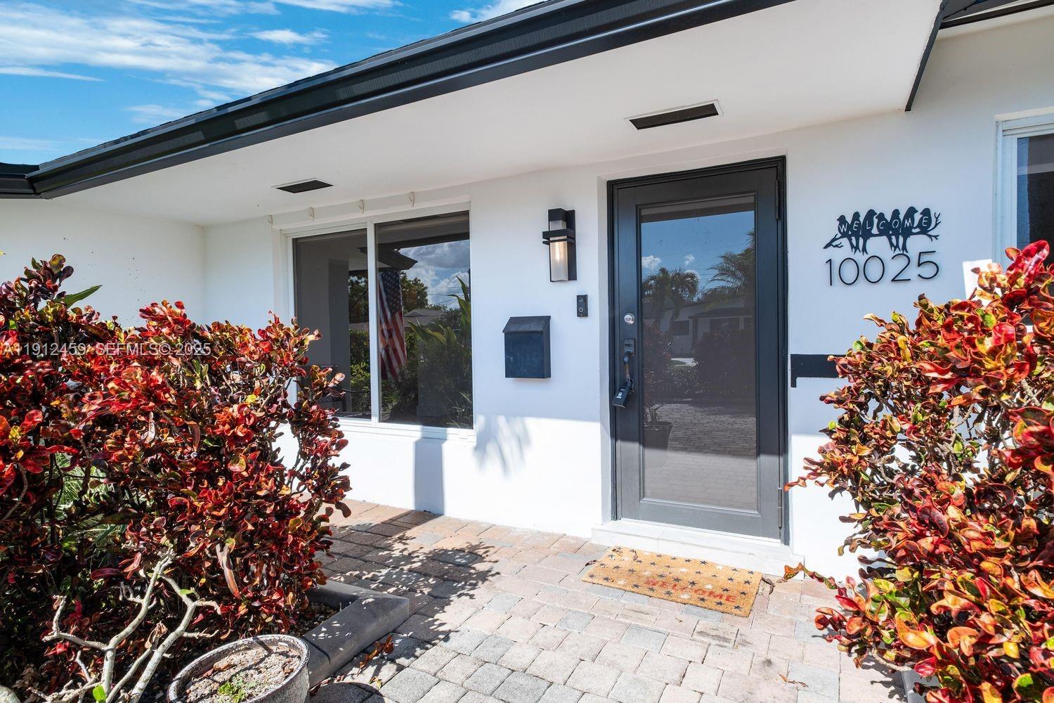 10025 Southwest 83rd Street Miami, FL 33173 - Photo 35 of 37 a front view of a house