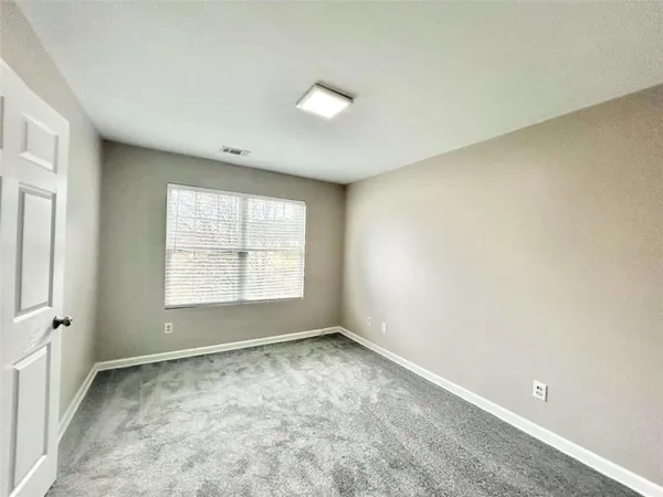 a view of empty room with window