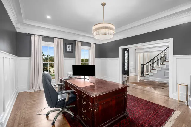 a kitchen with granite countertop stainless steel appliances sink and cabinets