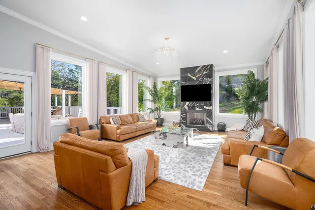 a view of washer and dryer with kitchen in the background