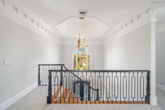 a bedroom with a bed and a table