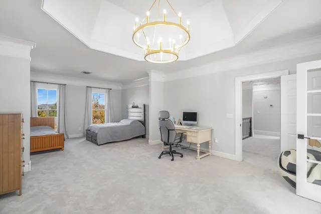 a bathroom with a toilet a sink and a mirror