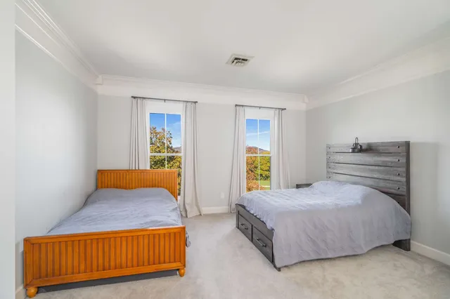 a outdoor space with patio the couches and a dining table with garden view