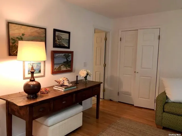 a bathroom with a sink a vanity and a mirror