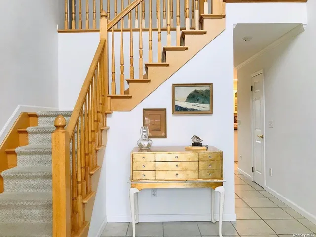 a view of entryway with a front door