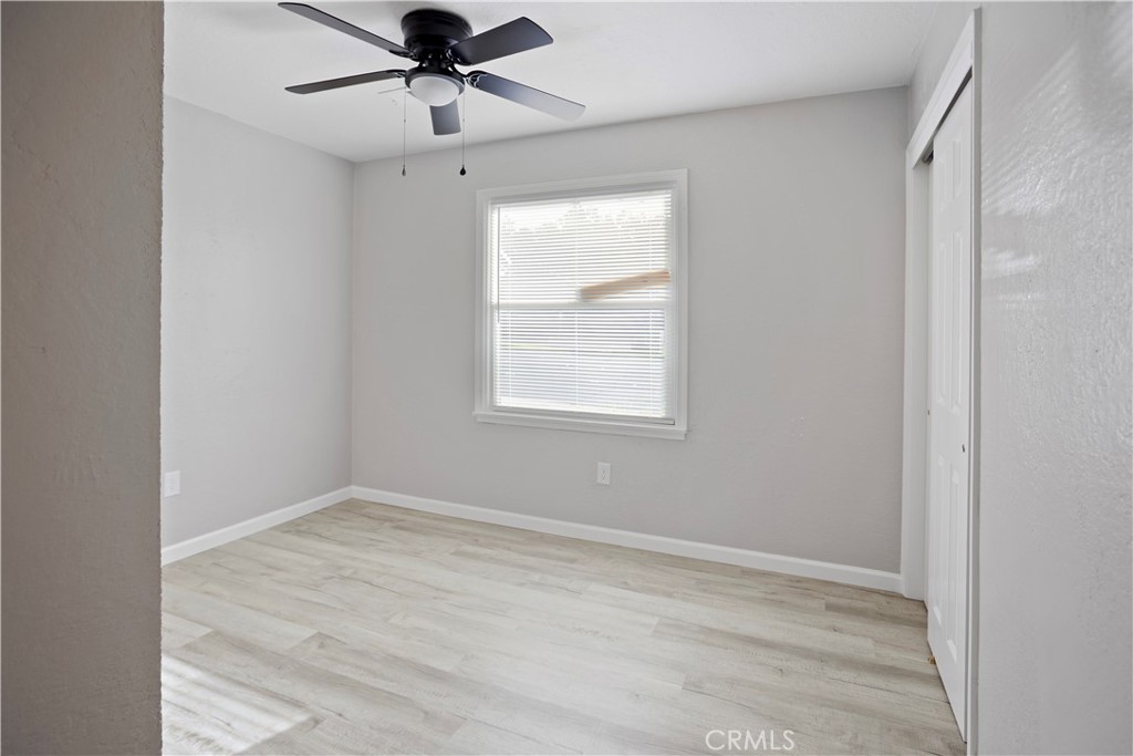 2525 R Street Merced, CA 95340 - Photo 13 of 19 a view of empty room with ceiling fan