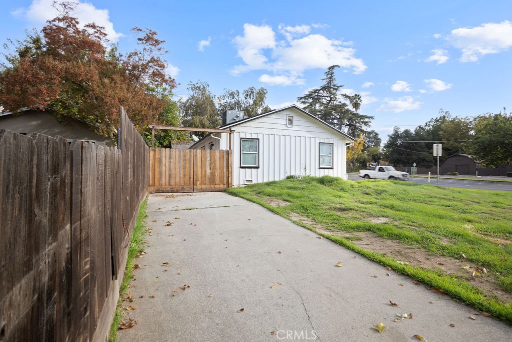 2525 R Street Merced, CA 95340 - Photo 17 of 19 a view of a house with a yard