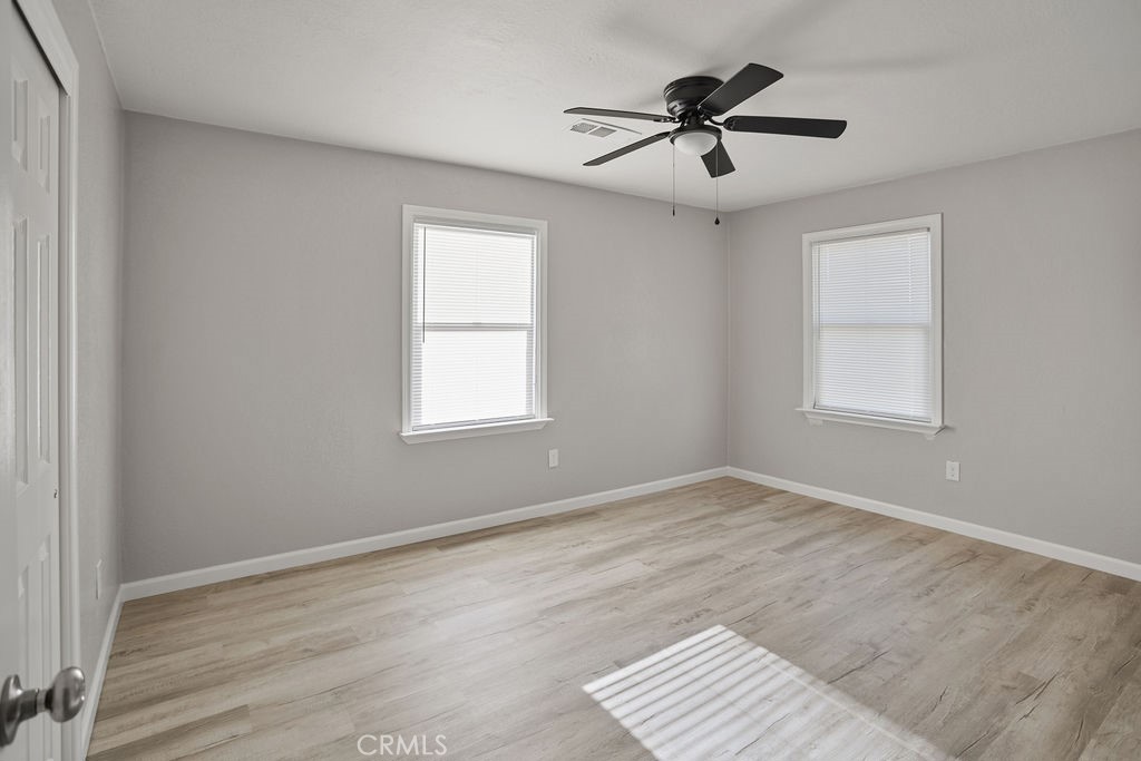 2525 R Street Merced, CA 95340 - Photo 10 of 19 a view of room with a ceiling fan