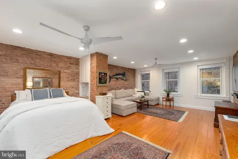 a picture of a bench in a white building