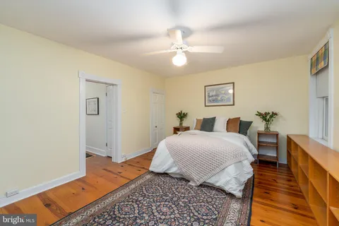 a view of a balcony with wooden floor and city view