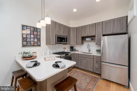 a view of a chairs and table in a patio