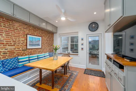 a view of a livingroom with furniture and window