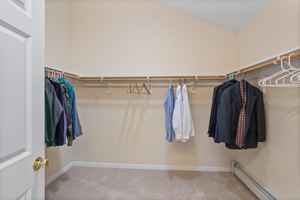 10 Lincoln Drive Acton, MA 01720 - Photo 17 of 32 a view of walk in closet with clothes