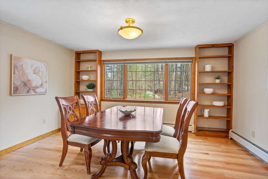 10 Lincoln Drive Acton, MA 01720 - Photo 6 of 32 a view of a dining room with furniture window and wooden floor