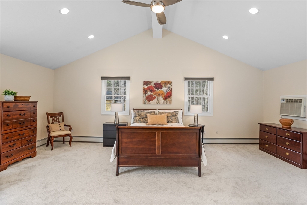 10 Lincoln Drive Acton, MA 01720 - Photo 10 of 32 a living room with furniture and paintings on the wall