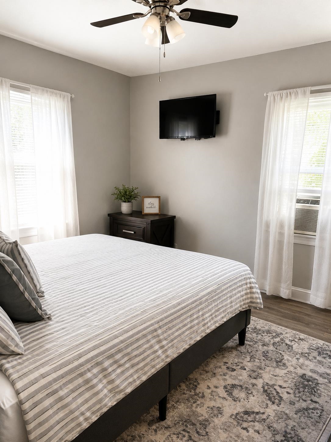 613 Alpha Street Waynesboro, VA 22980 - Photo 4 of 16 a bedroom with a bed and a flat screen tv