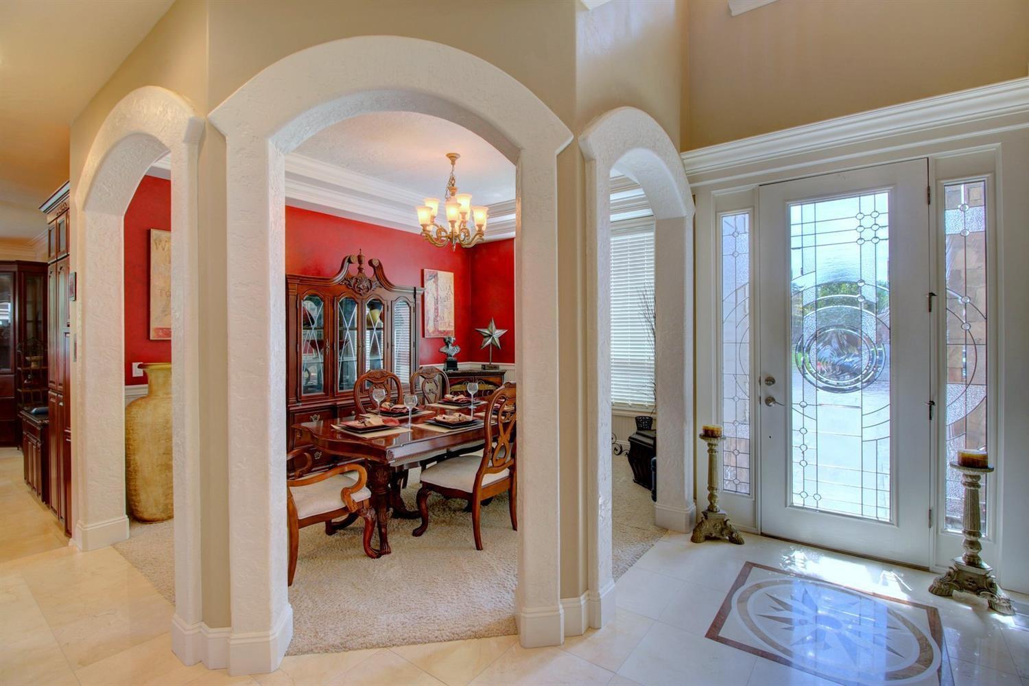 Formal dining room with custom wood touc