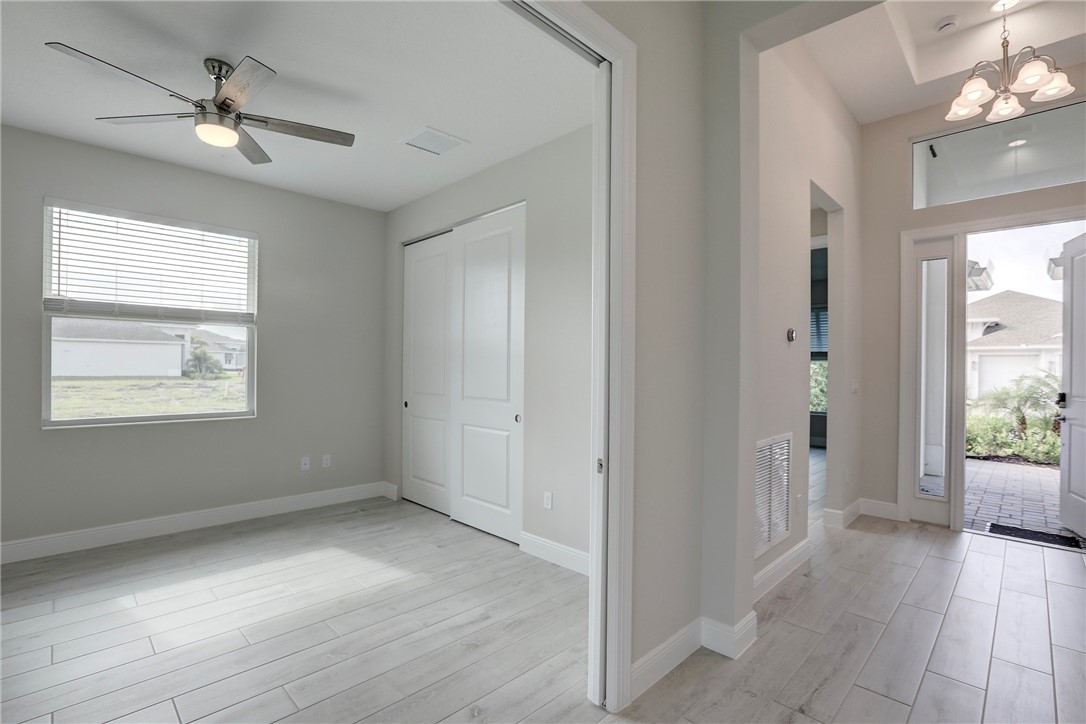 6423 High Pointe Circle Vero Beach, FL 32967 - Photo 13 of 36 a view of an empty room with a window