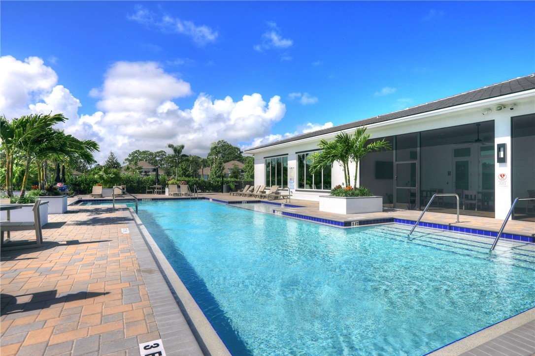 6423 High Pointe Circle Vero Beach, FL 32967 - Photo 31 of 36 a view of a house with swimming pool and sitting area