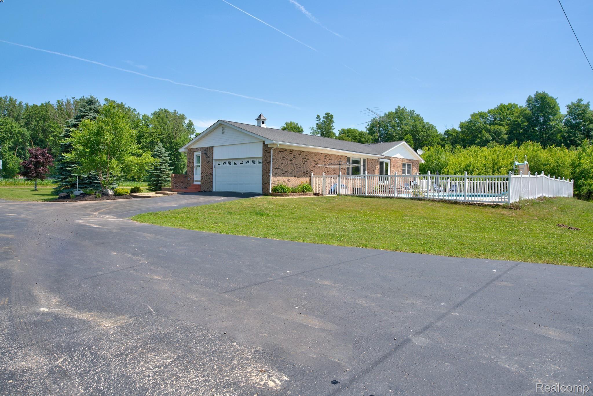 10575 West Sober Road Webberville, MI 48892 - Photo 40 of 46 FULL VIEW OF THE FENCED POOL