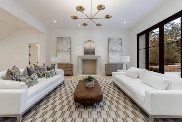 a spacious bathroom with a bathtub and shower
