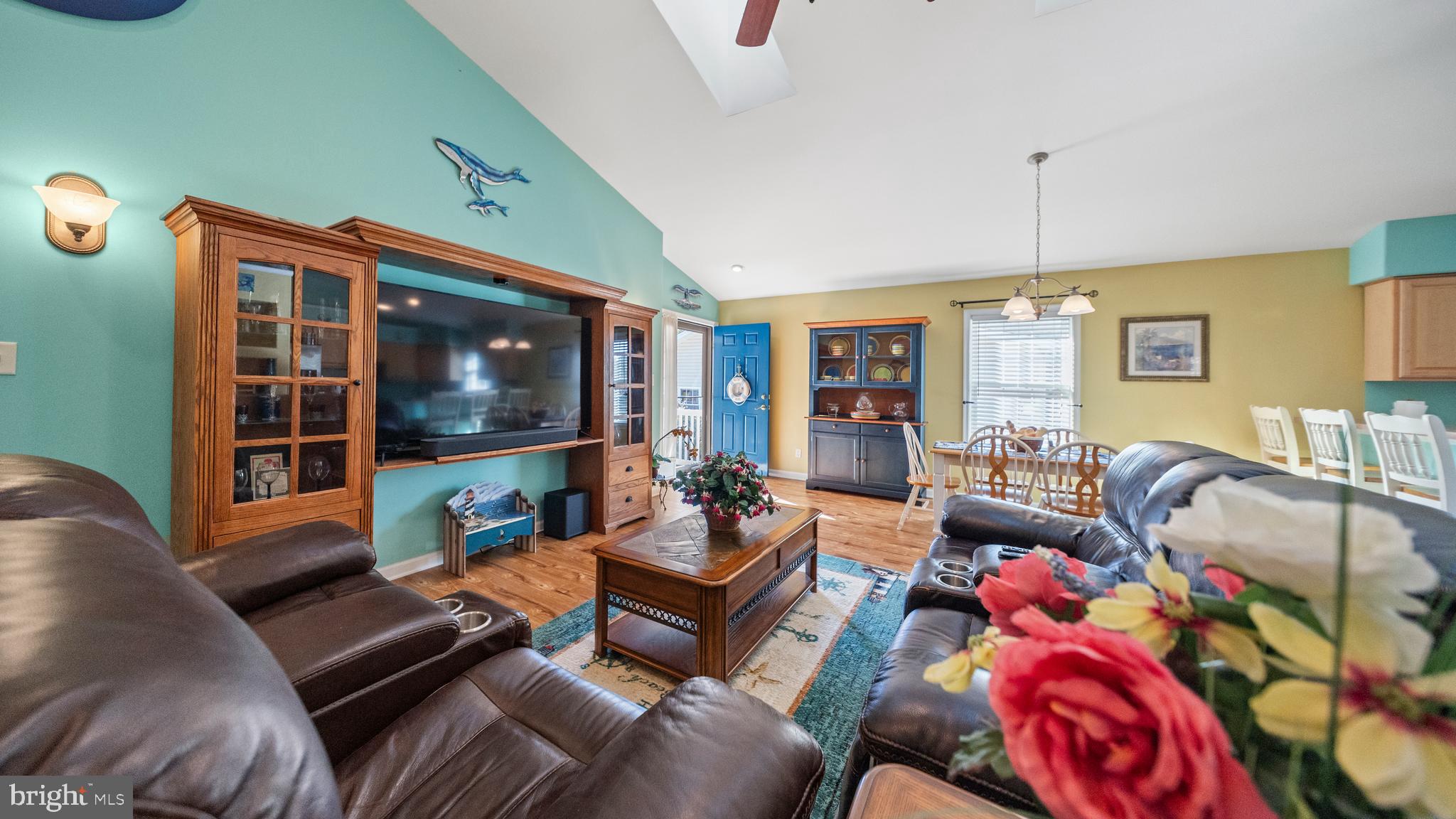 128 Sandyhook Road Ocean Pines, MD 21811 - Photo 12 of 37 a living room with furniture and a floor to ceiling window