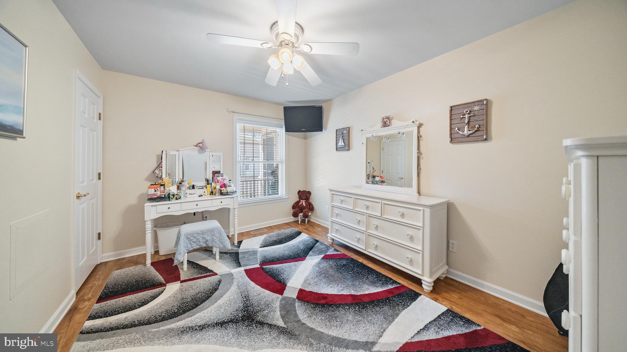 128 Sandyhook Road Ocean Pines, MD 21811 - Photo 19 of 37 a living room with furniture and wooden floor