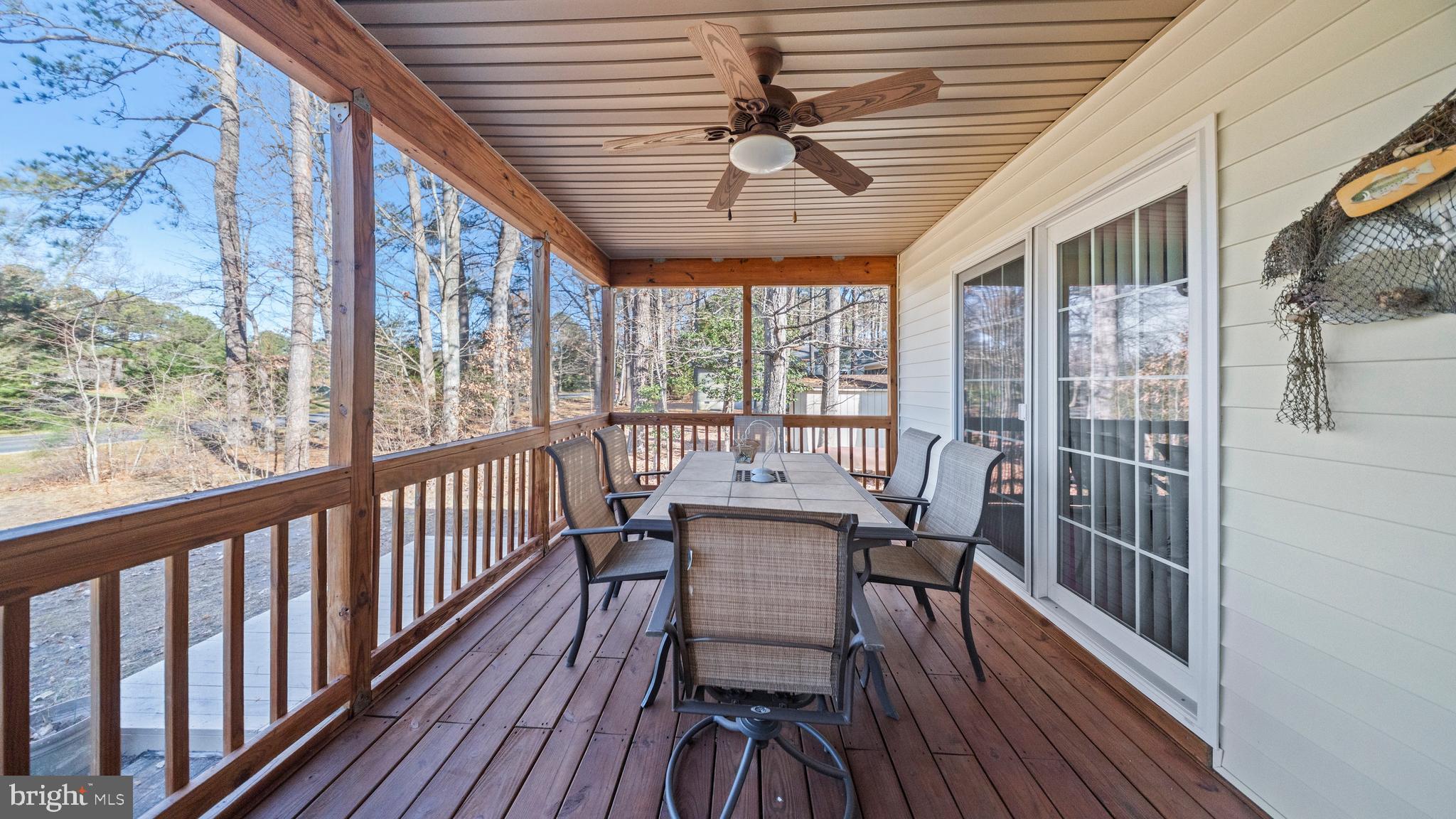 128 Sandyhook Road Ocean Pines, MD 21811 - Photo 23 of 37 a view of a dining room with furniture window and wooden floor