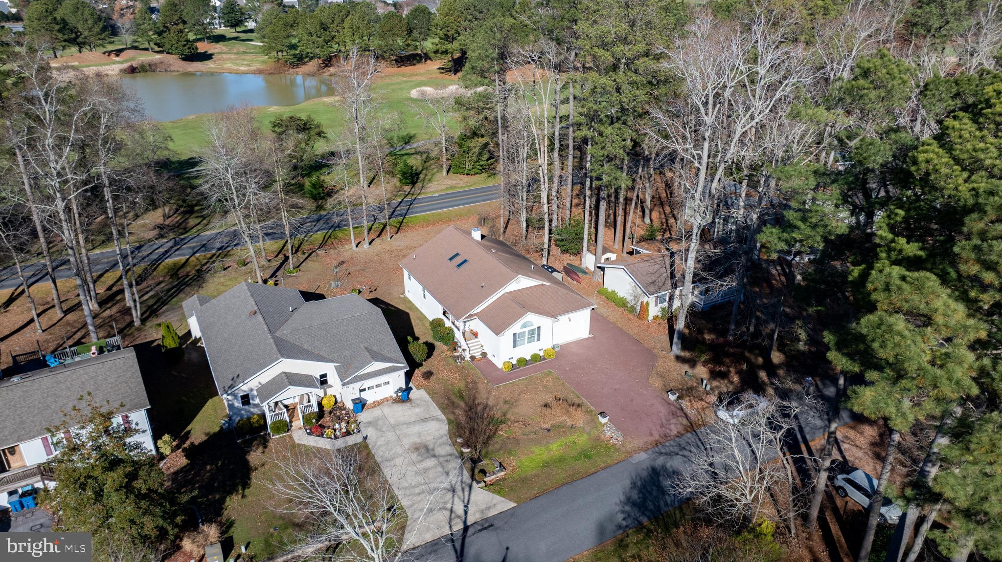 128 Sandyhook Road Ocean Pines, MD 21811 - Photo 25 of 37 an aerial view of a house with outdoor space and lake view