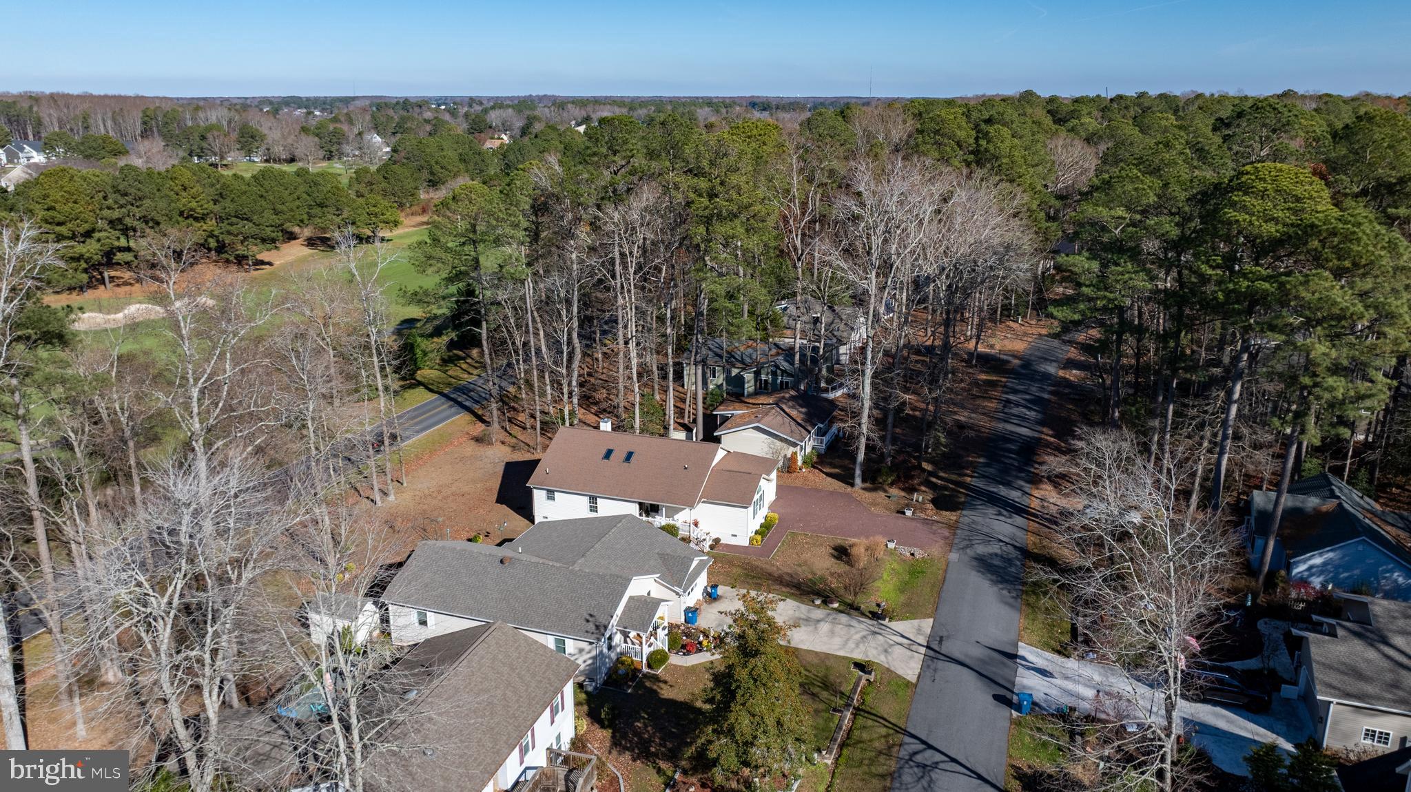128 Sandyhook Road Ocean Pines, MD 21811 - Photo 26 of 37 an aerial view of a house with a yard