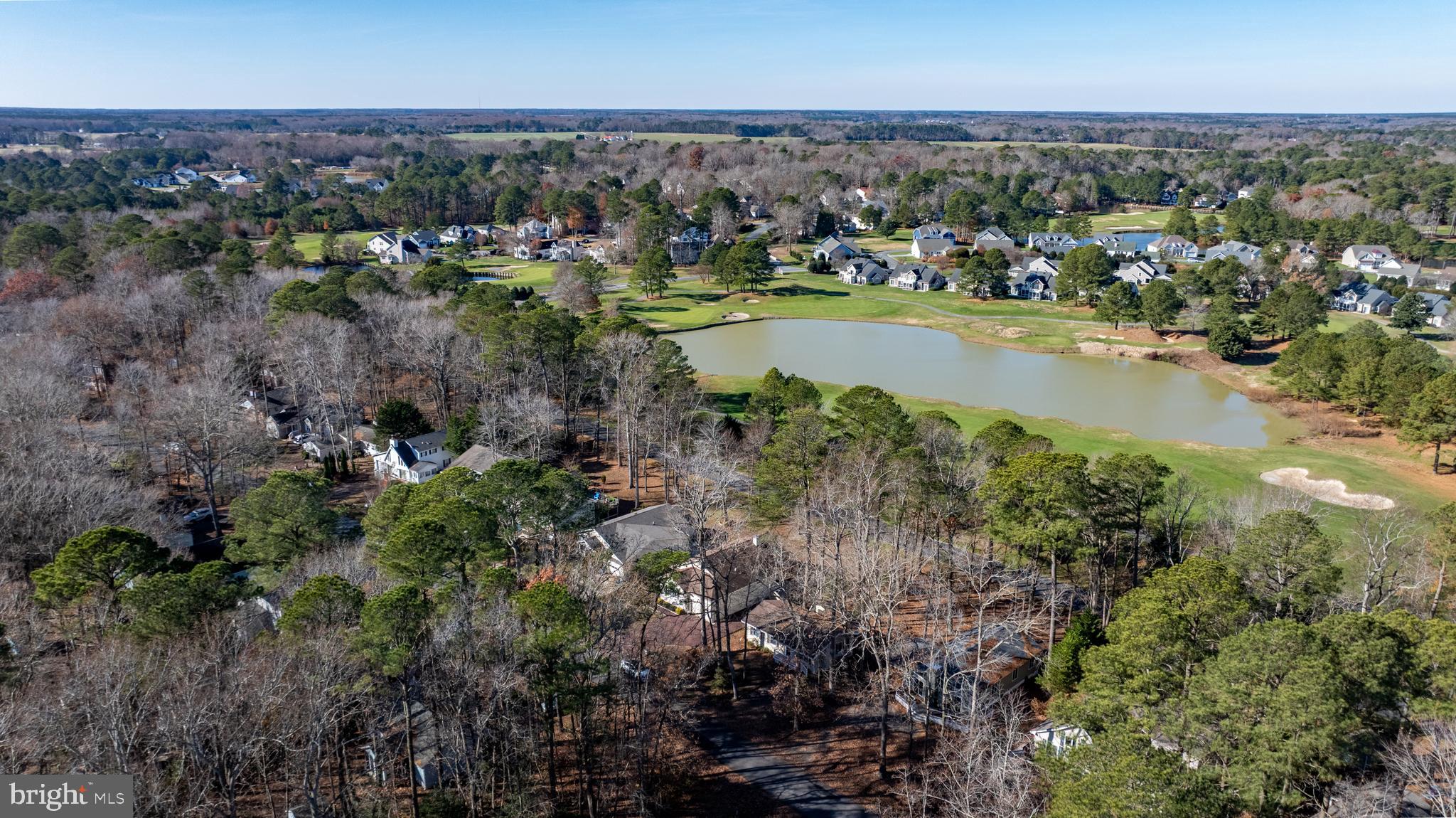 128 Sandyhook Road Ocean Pines, MD 21811 - Photo 32 of 37 an aerial view of residential houses with outdoor space and trees