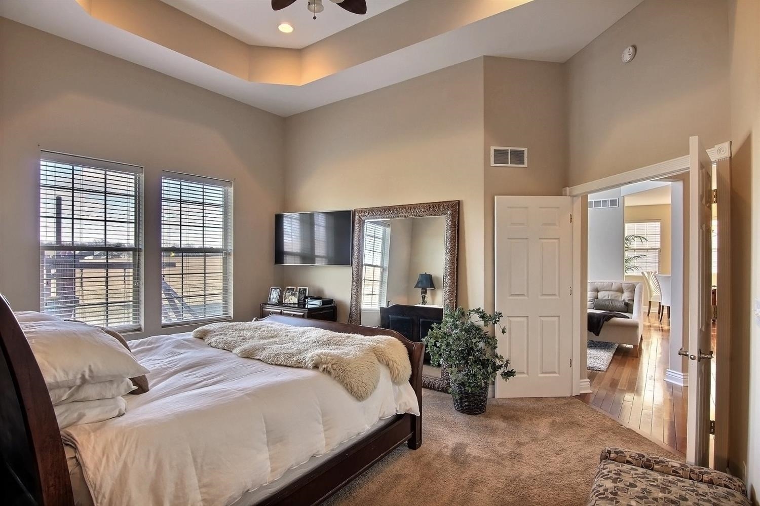 10511 Pike Street Crown Point, IN 46307 - Photo 13 of 26 a bedroom with a bed and large windows