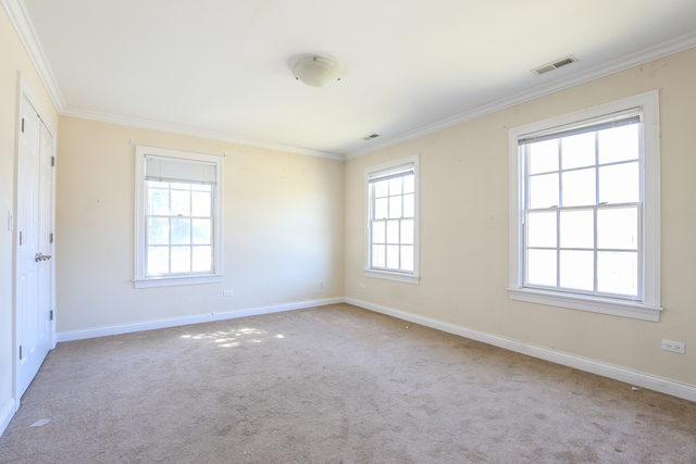 1059 Shermer Road Northbrook, IL 60062 - Photo 12 of 23 an empty room with a window