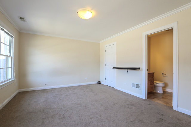 1059 Shermer Road Northbrook, IL 60062 - Photo 13 of 23 an empty room with a bathroom and a sink
