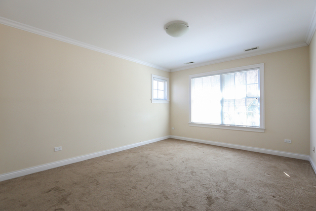 1059 Shermer Road Northbrook, IL 60062 - Photo 15 of 23 an empty room with a window