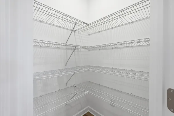 a view of a room with racks on the wall