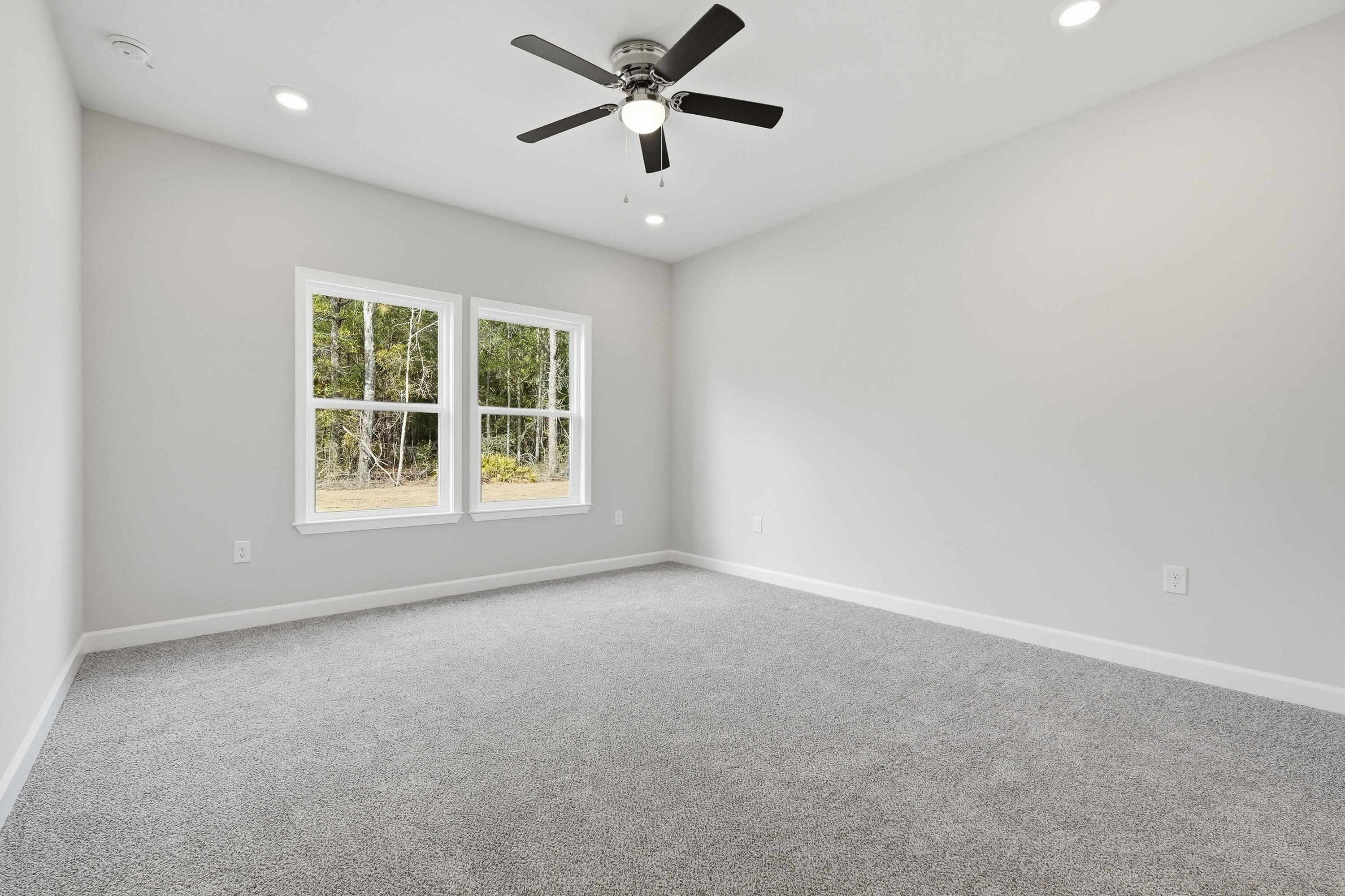 6102 Mildreds Way Crestview, FL 32539 - Photo 15 of 25 a view of an empty room with a window